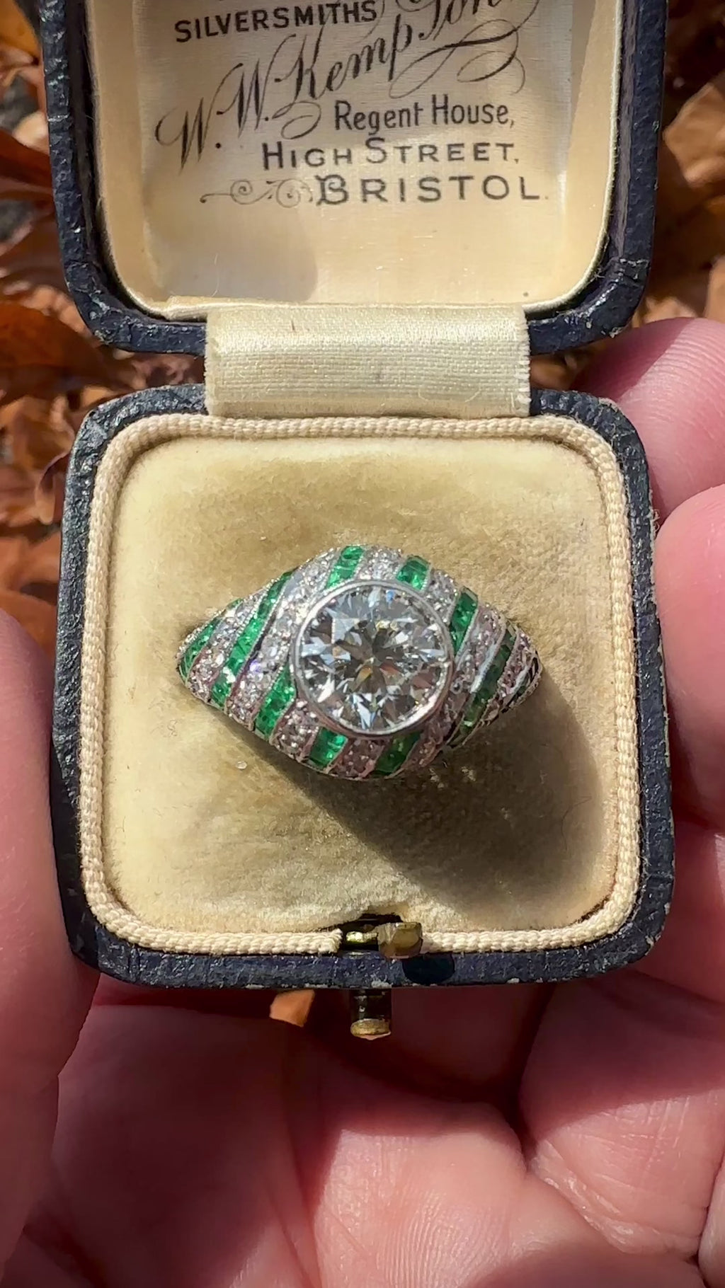Platinum Art Deco Diamond and Emerald Ring With Transitional Cut Diamond